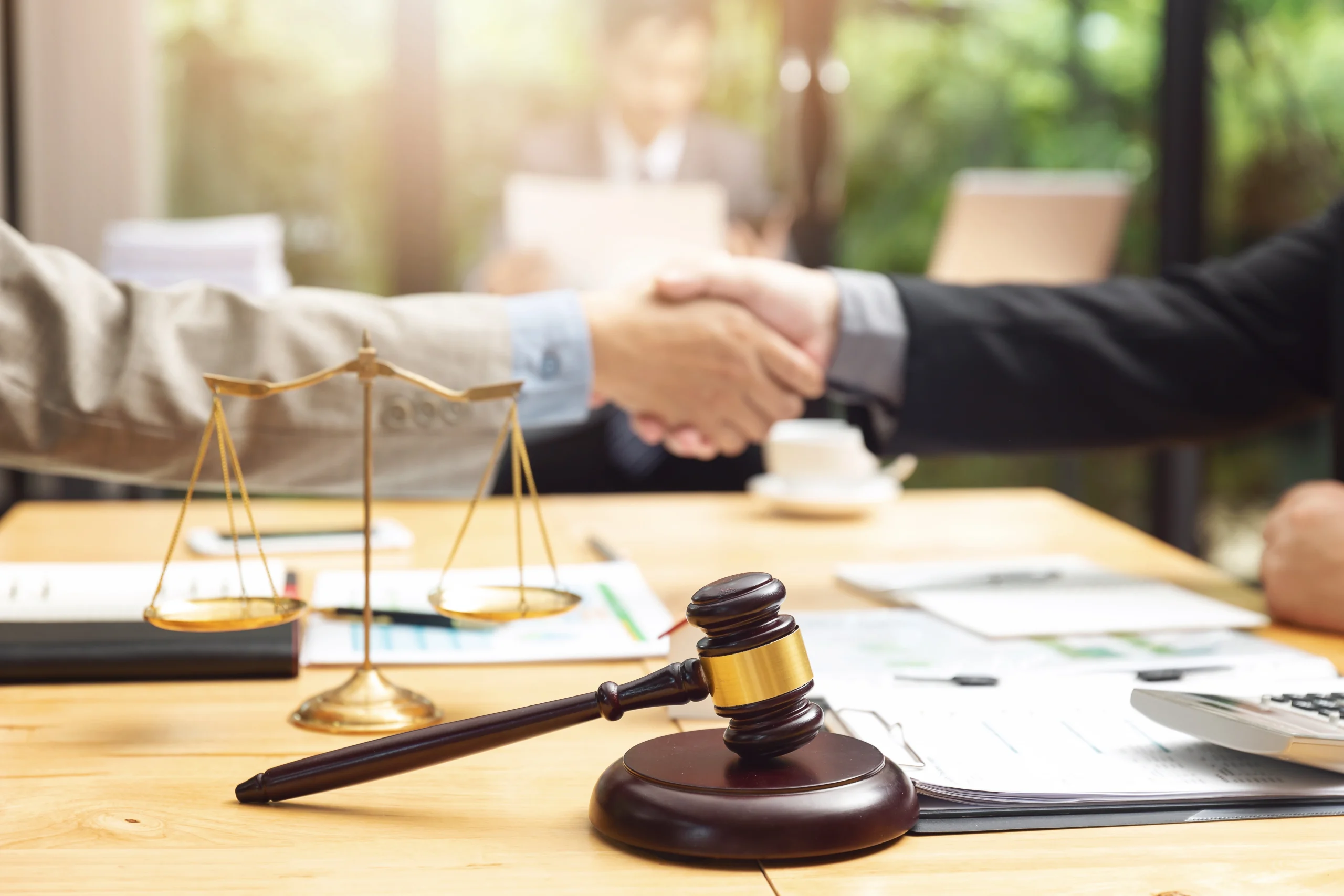 Client shakes lawyers had over table. Our tax attorney in Austin, Texas will fight to protect your rights from IRS tax collection and help you find tax relief or collection alternatives.