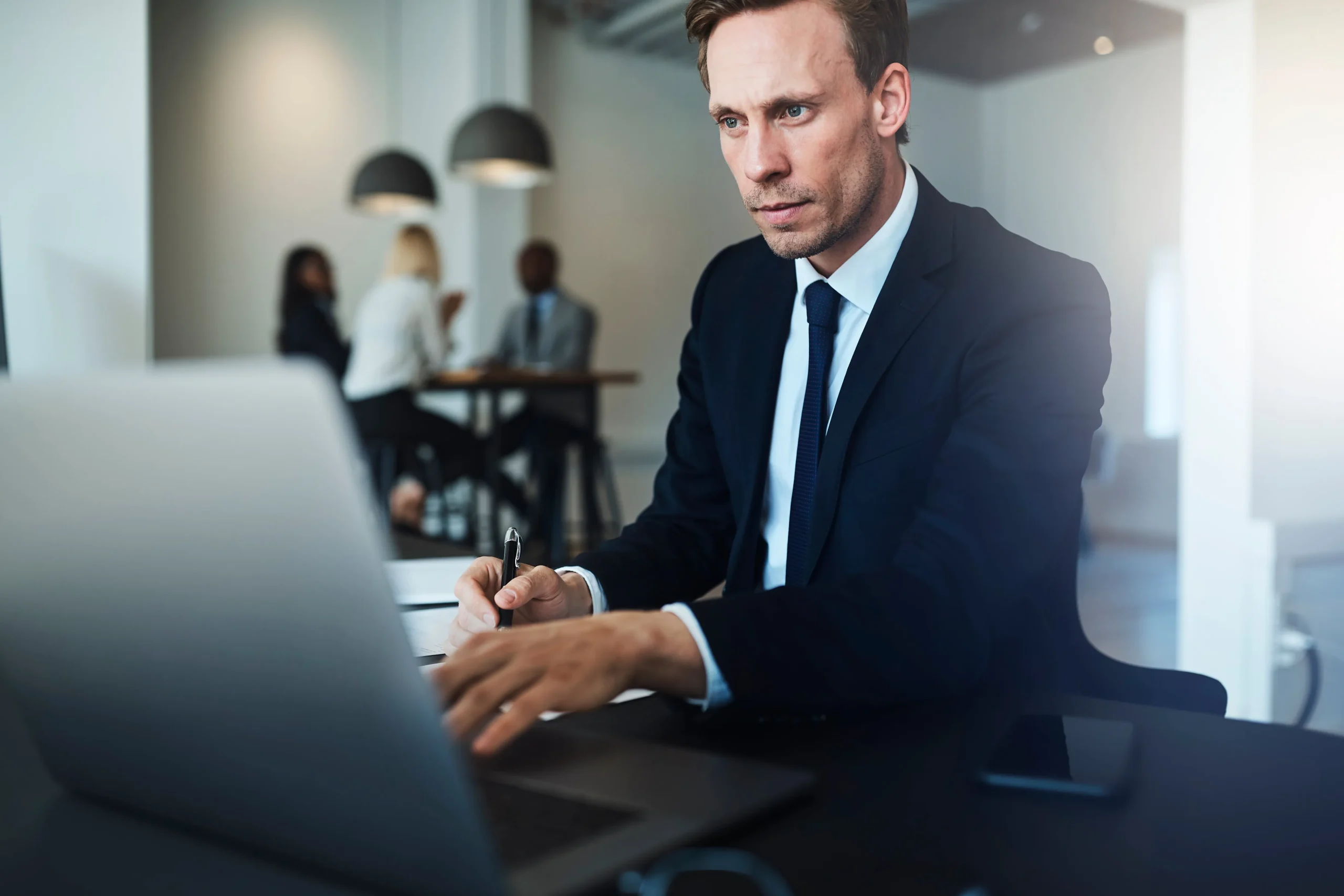 An attorney working on his computer.