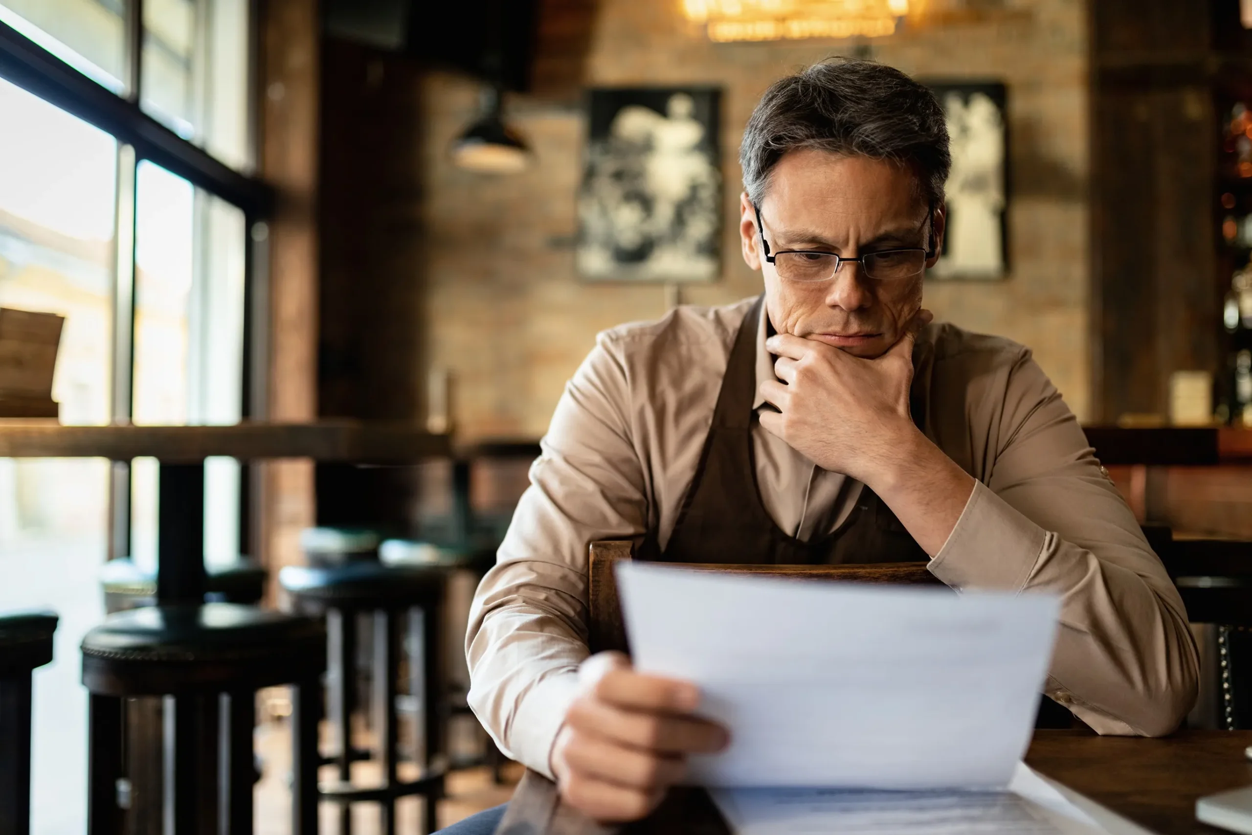 Business owner looking over his tax audit letter.