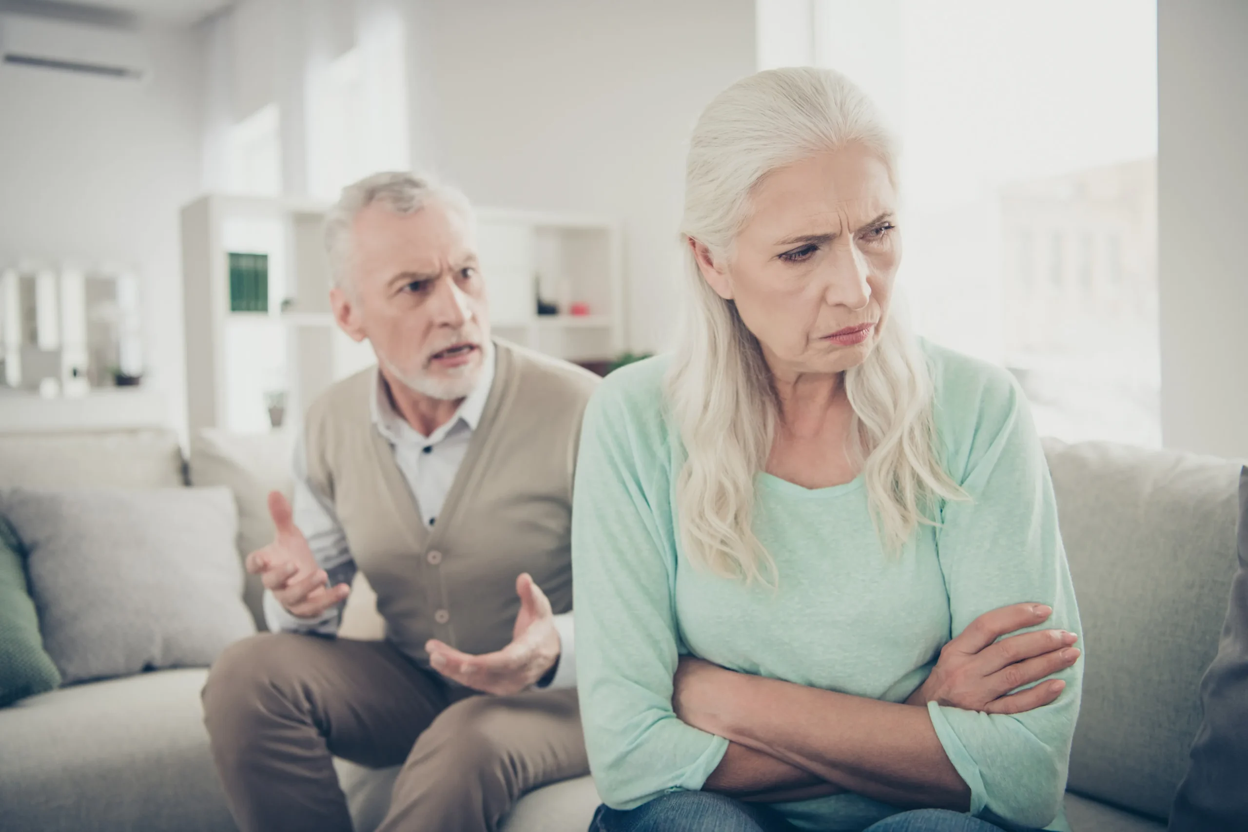 A man and wife arguing about taxes.