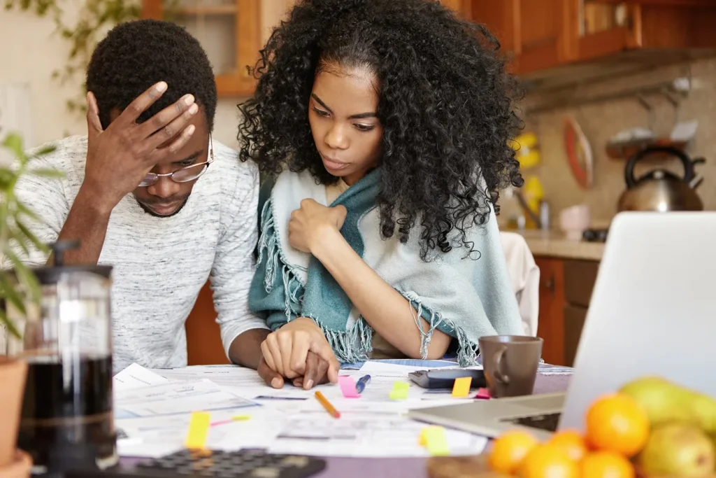 A couple reviewing their taxes.