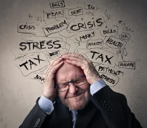 A man holding his head with multiple words around his head.