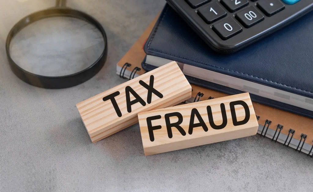 Tax fraud written on blocks.